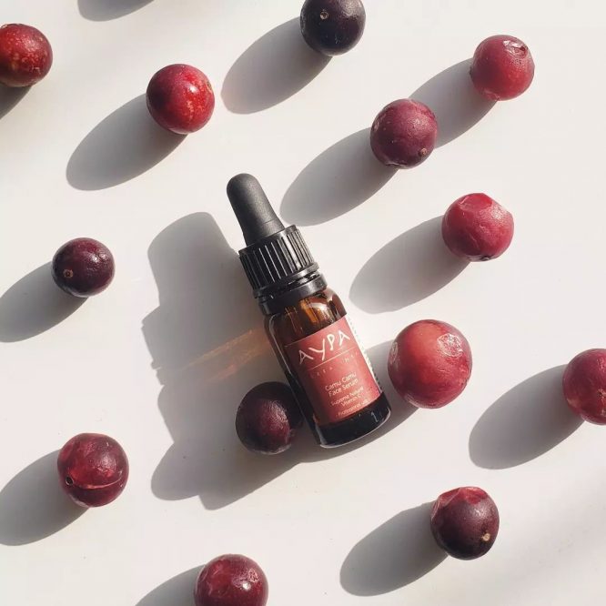 Serum product surrounded with Camu Camu ingredients